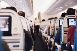 shallow focus photography of people inside of passenger plane