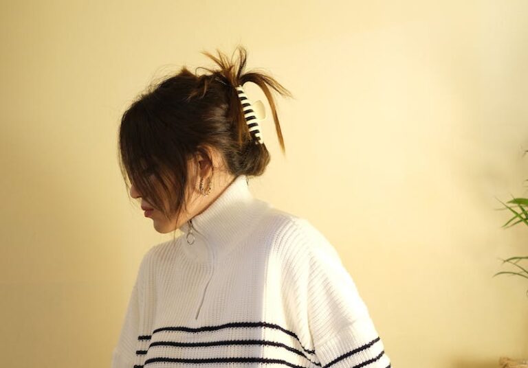 Woman in Striped Long Sleeve Shirt Near the Sideboard