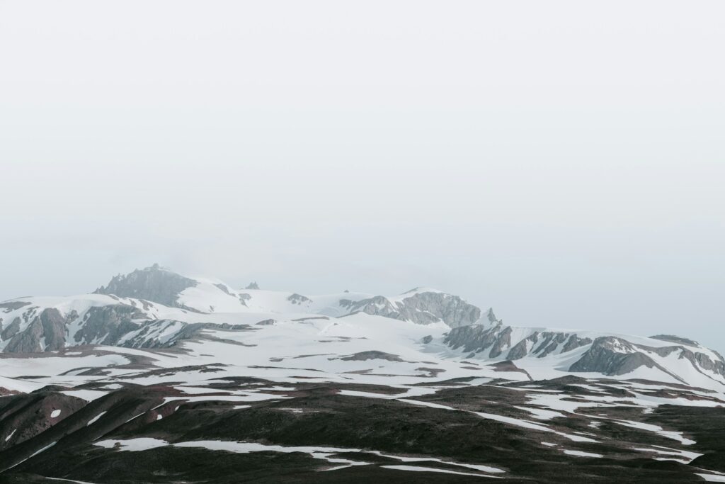 mountain coated with snow