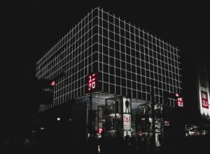 UNIQLO building with billboards at night