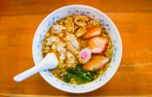 a bowl of soup with a spoon in it