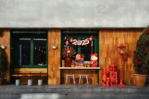 A small building with a lot of potted plants in front of it